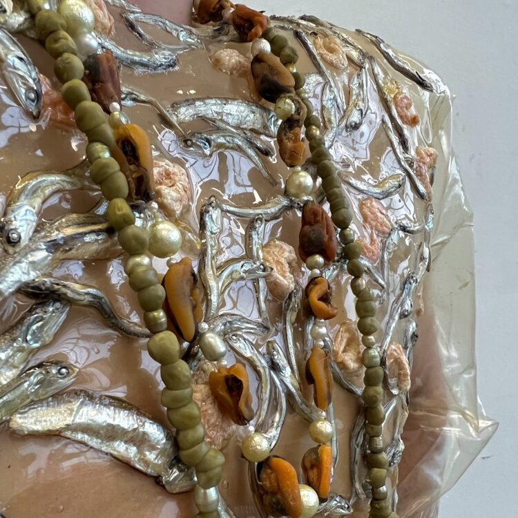 Brendan O’Shaughnessy, Edible Garment, 2023. 61cm x 51cm x 30cm (24” x 20” x 12”). Hand stitch, beading, bio-textile production. Gelatin-based edible bio-textile, sardines, shellfish, peas and pearls.