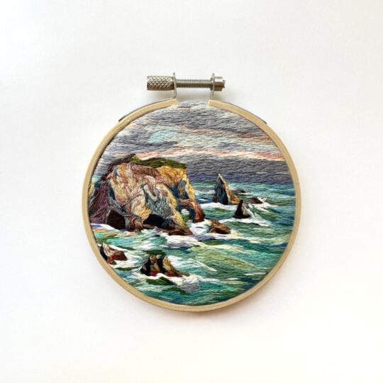 Cassandra Dias, Rocks at Malibu, 2022. 9cm (3.5"). Thread painting, cotton embroidery thread, canvas, bamboo hoop.