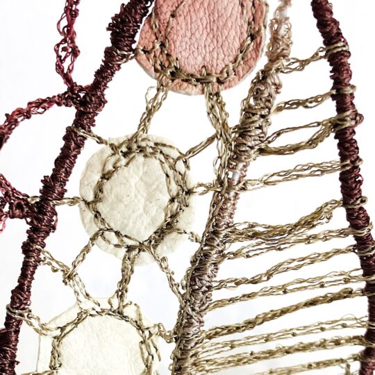Priscilla Edwards, Pimpilowe (detail), 2023. 21cm x 50cm (8" x 20"). Free machine embroidery. Wire, leather, rayon thread.