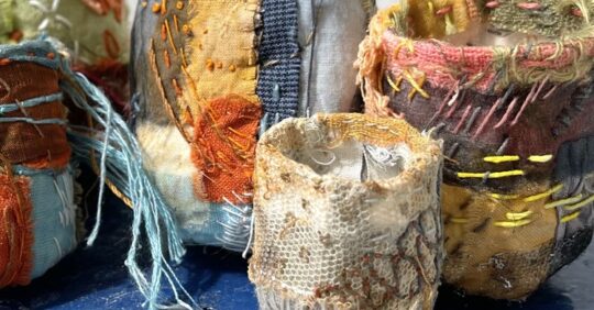 Rachael Singleton, Irish Stitchpots (detail), 2022. 5cm to 8cm high (2” to 3” high). Hand stitch. Calico, natural fabrics.