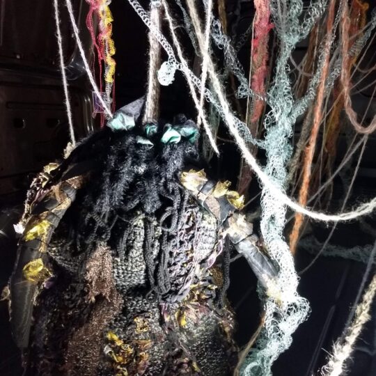 Olga Teksheva, Appearing/Disappearing (detail), 2019. Installation. Crochet, hand embroidery. Ford van, fishing thread, cotton, vintage satin, wool, acrylic fibres, metallized lace, recycled clothing.