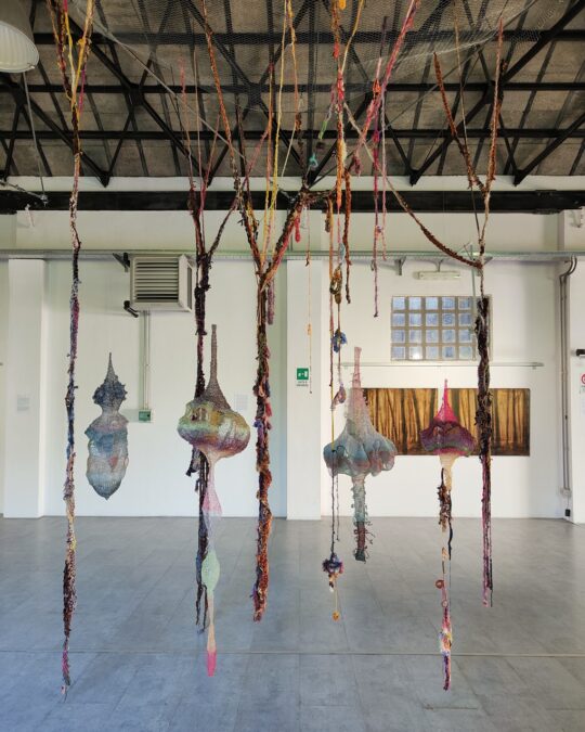 Olga Teksheva, Hidden Treasures (installation), 2021-ongoing. 5m x 5m x 5m (16' x 16' x 16'). Crochet, hand embroidery, textile collage. Fishing thread, metal wire, chiffon, lace, vintage Japanese brocades.