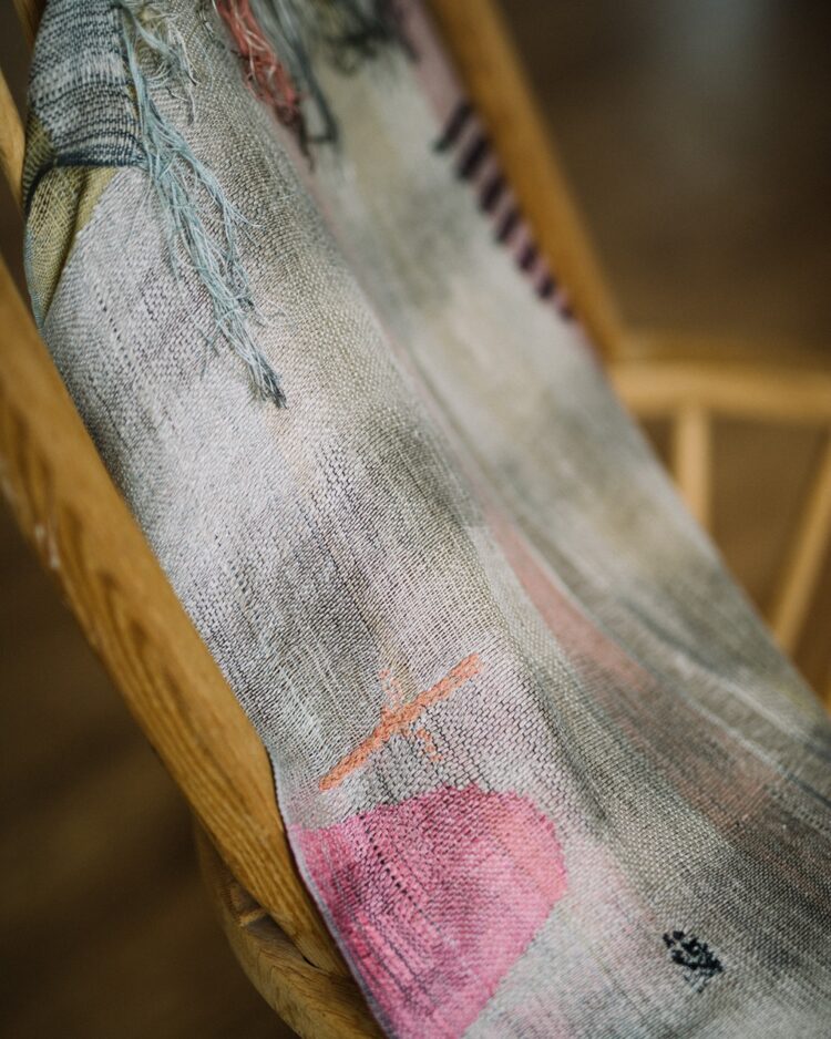 Kate Whitehead, Honesty Two (detail) – Honesty is the Best Policy Series, 2019. 45cm x 100cm (17½" x 39½"). Salvaged grey linen: pink silk warp; gold, orange, pink and black silk weft; pink print section; black, pink and terracotta embroidered detail. Hand weave. Photo: Sarah Mason Photography.