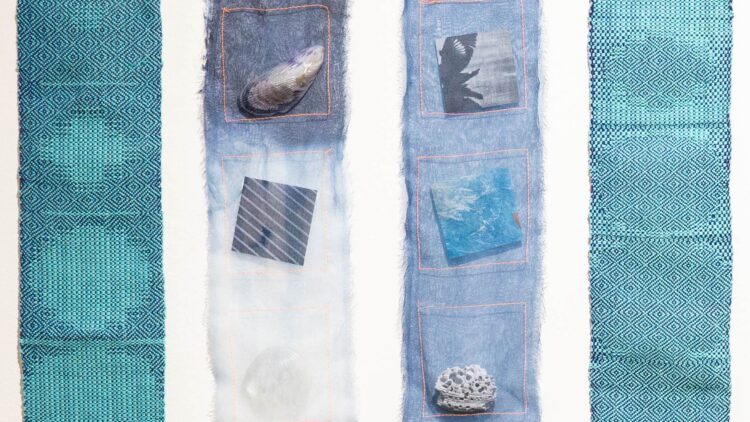 Amanda Britton, One Blue from Another (detail), 2023. Seven strips, each 10cm x 51cm (4" x 20"). Weaving, dyeing, resin casting, machine stitching. Organza, indigo dye, Johanna Norry’s woven remnants, grommets, resin, shells, polyester thread.