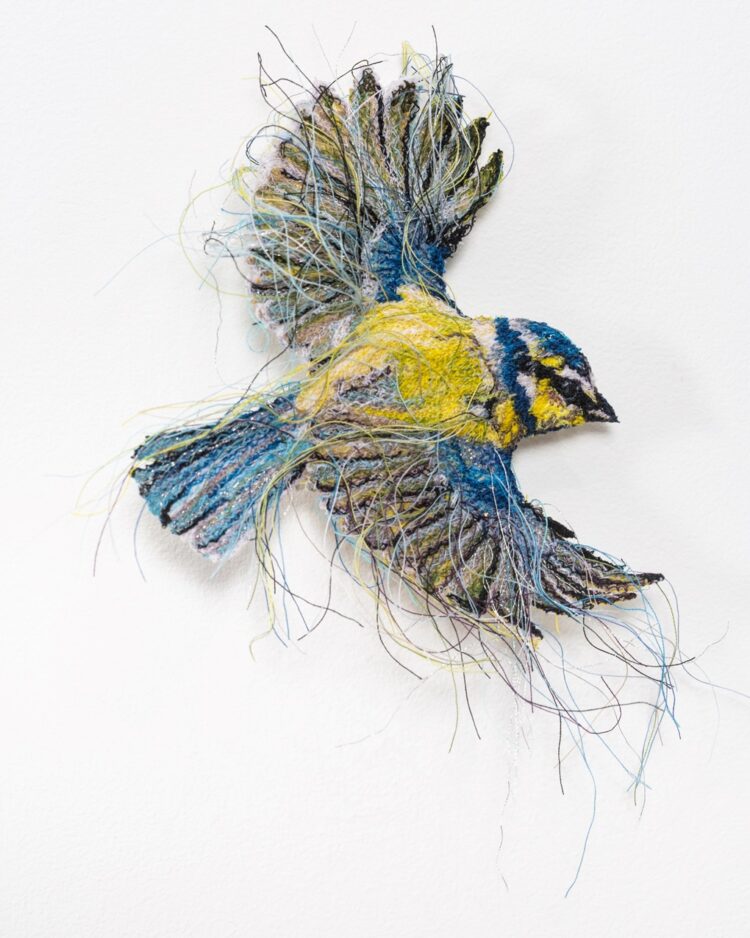 Alison Carpenter-Hughes, Blue Tit in Flight, 2020. Size unknown. Free motion embroidery. Threads. Photo: David Wilson Clarke.