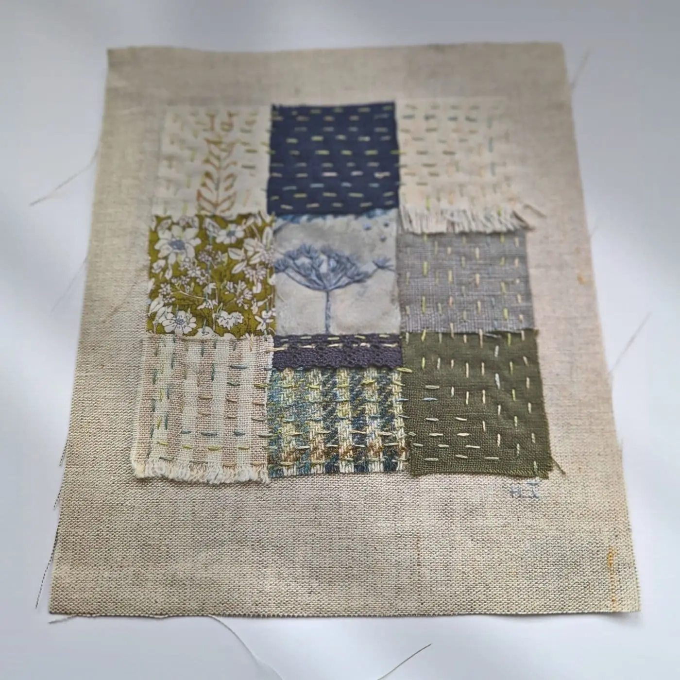 A skewed stitched textile sample
