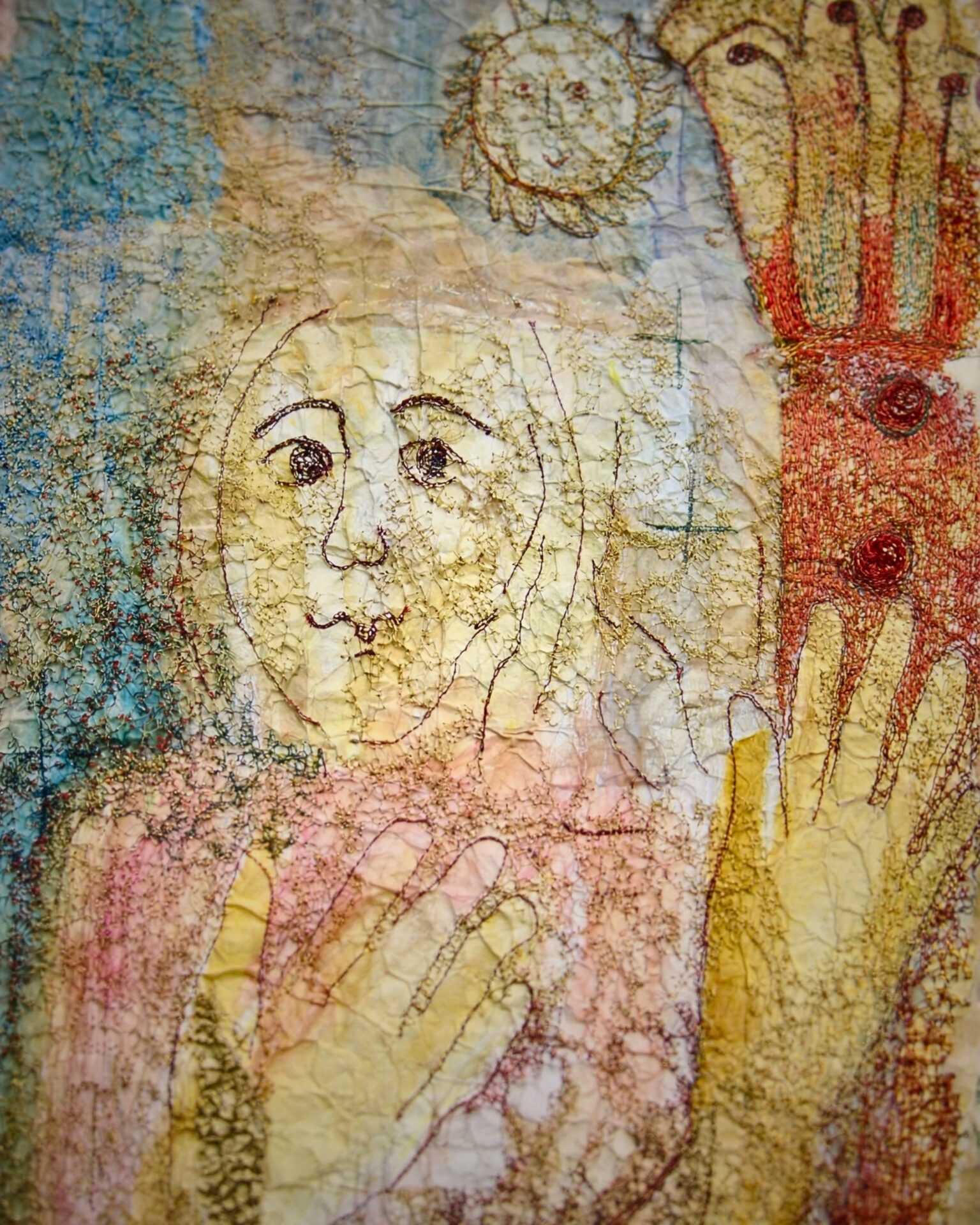 Textured piece depicting a woman with hands