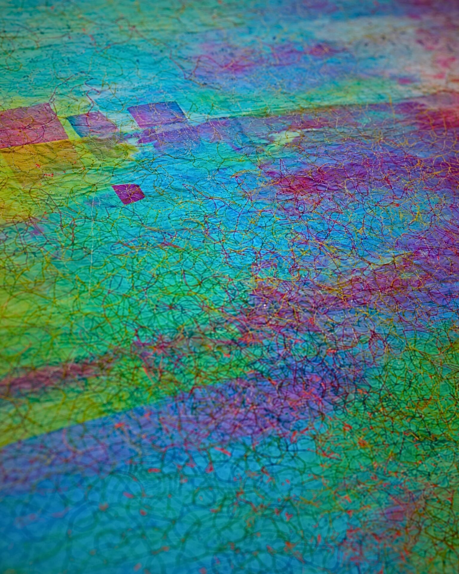 Vibrant abstract multicoloured textured surface.