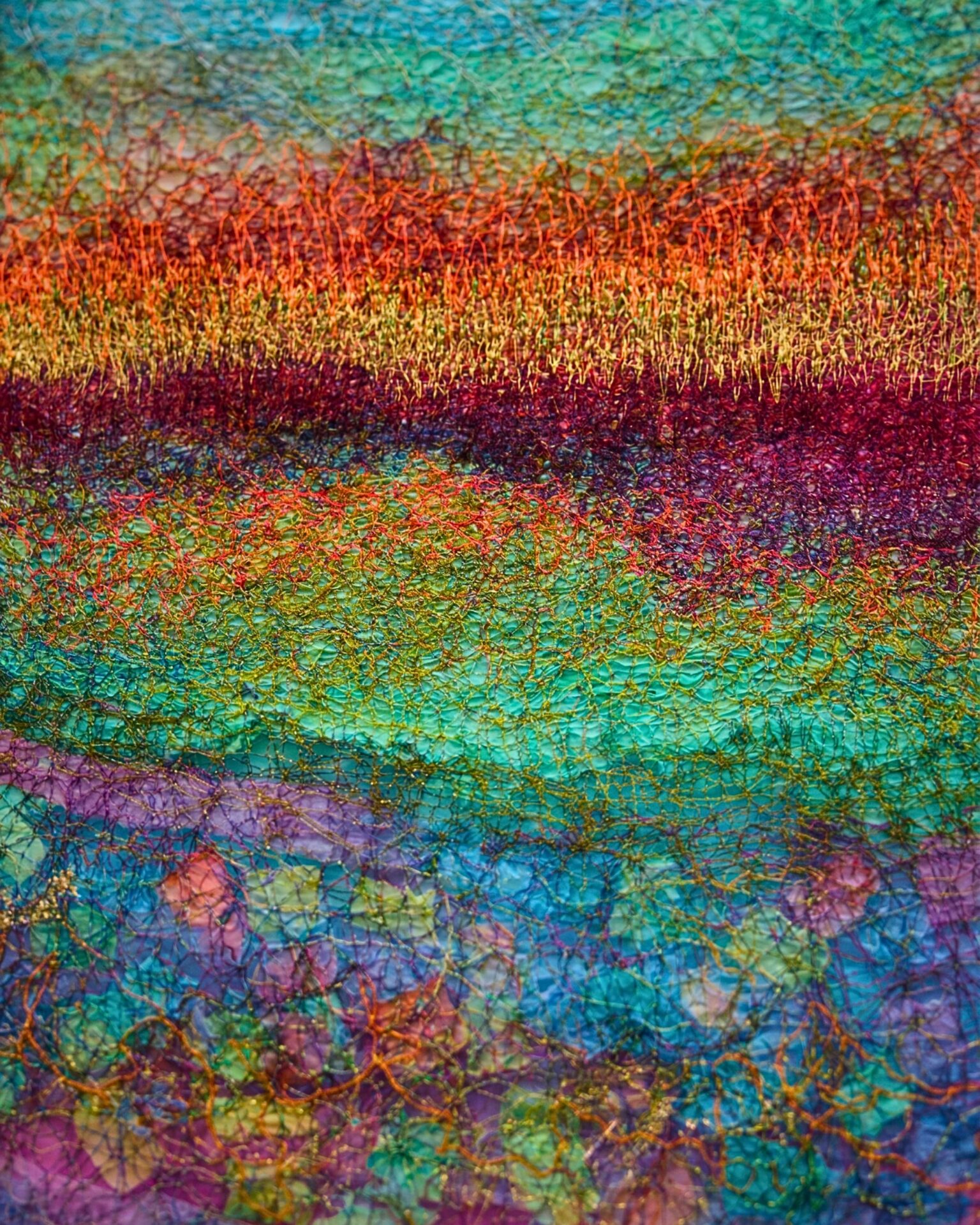 Vibrant abstract textile art piece.