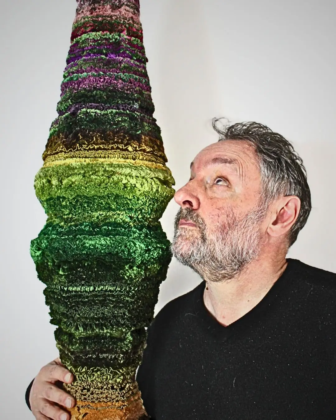 Adrian Smith & his textile artwork of a totem.