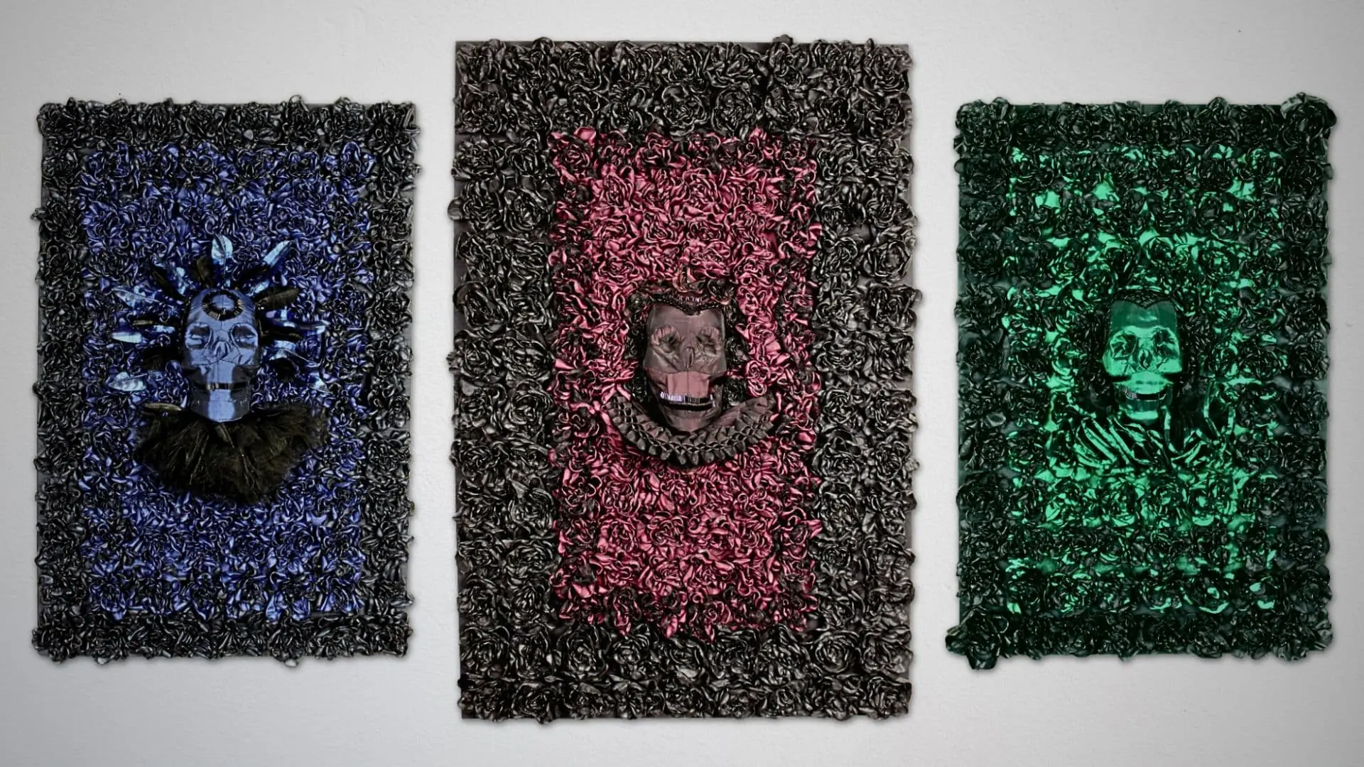 Three textured, vibrant wall textile artworks.