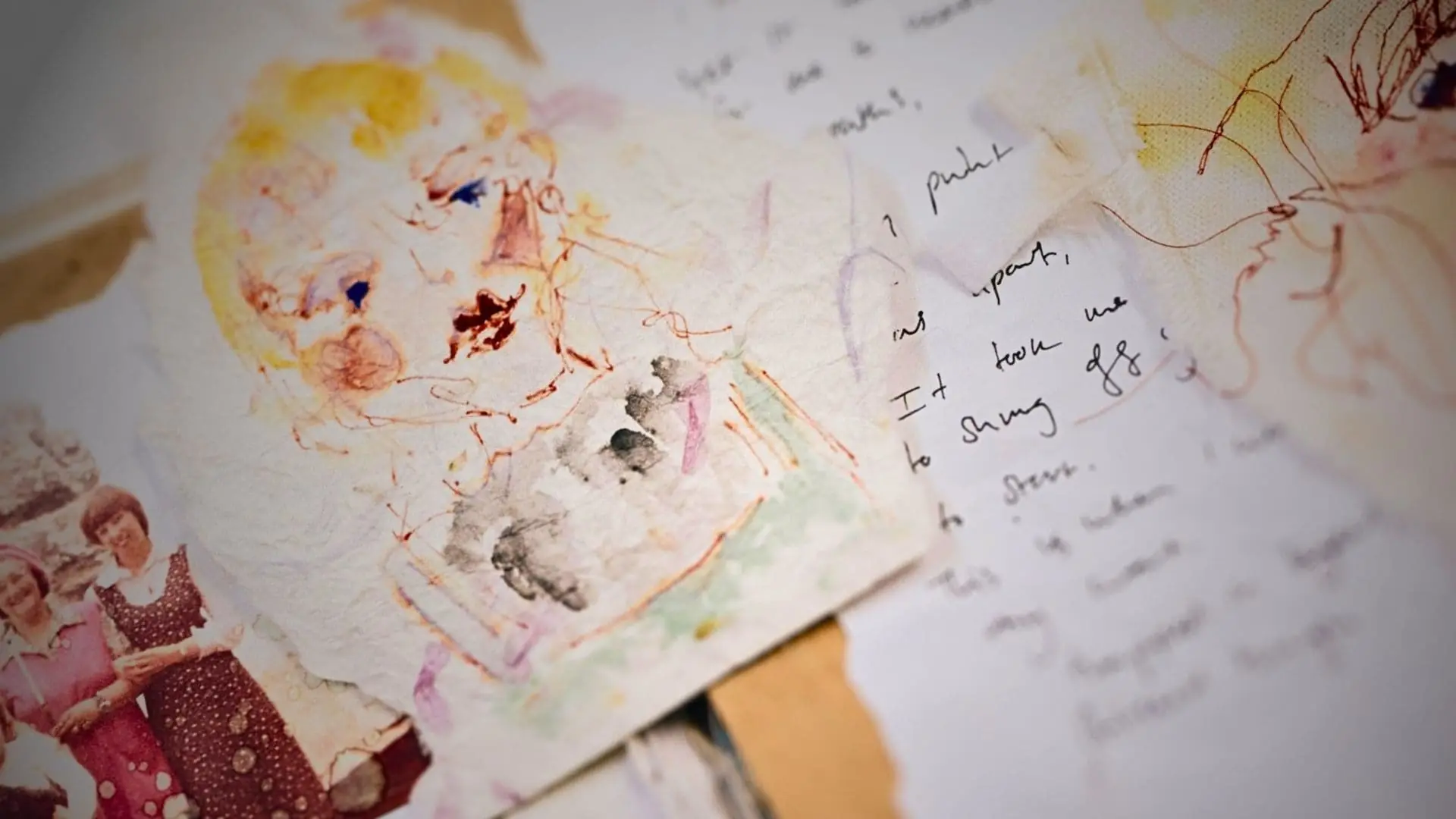 A sketch of a woman's face using mixed media