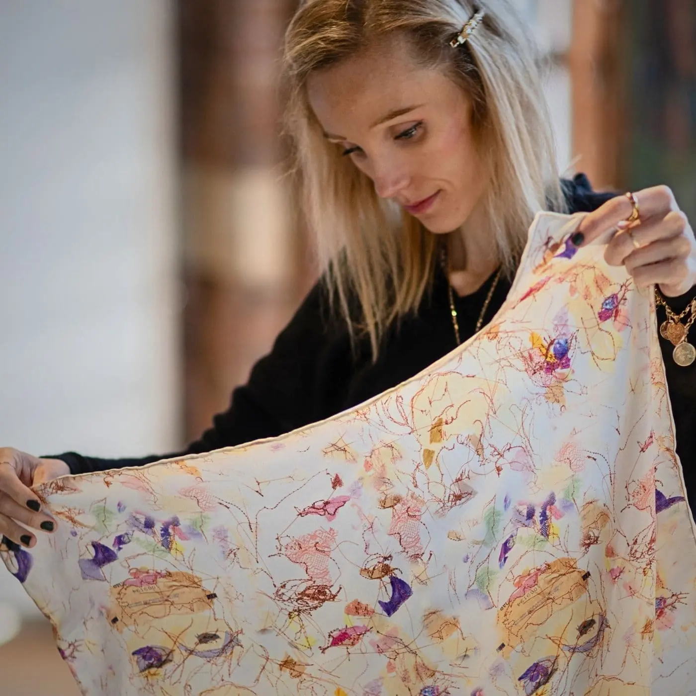 Ailish Henderson with a printed silk scarf