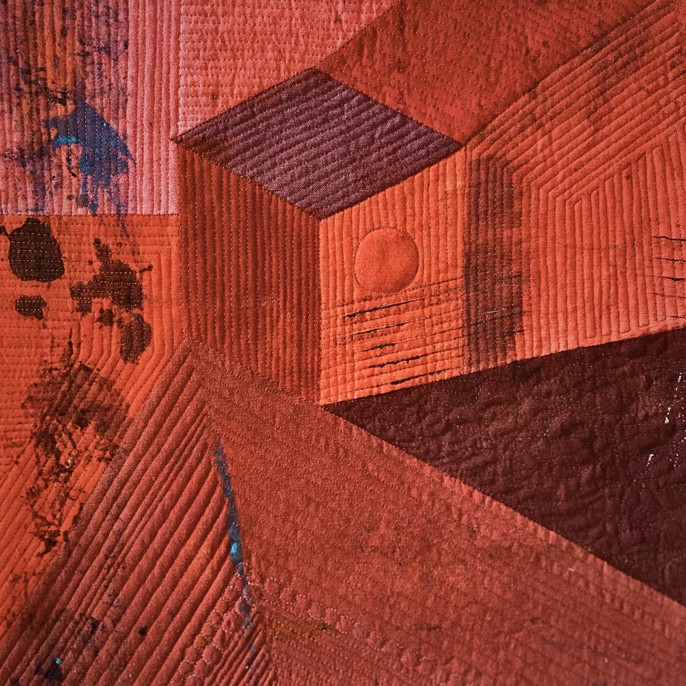 Abstract red geometric patterns and textures.