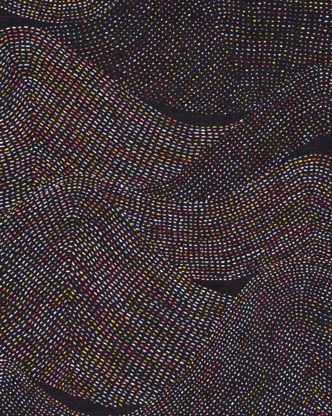 A closeup detail of hand stitched artwork in autumnal tones