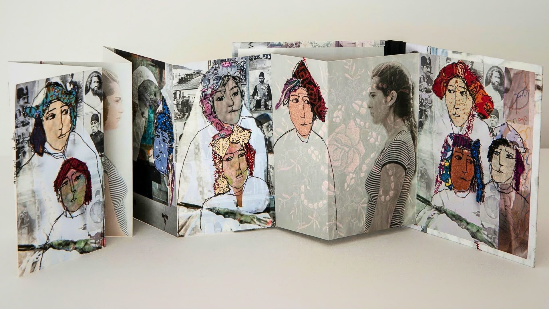 Artistic collage of embroidered portraits in a concertina booklet
