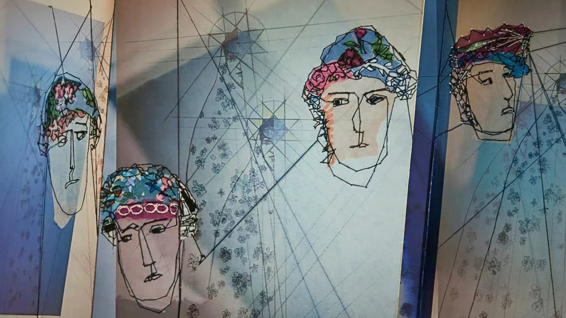 Abstract faces with floral headpieces.