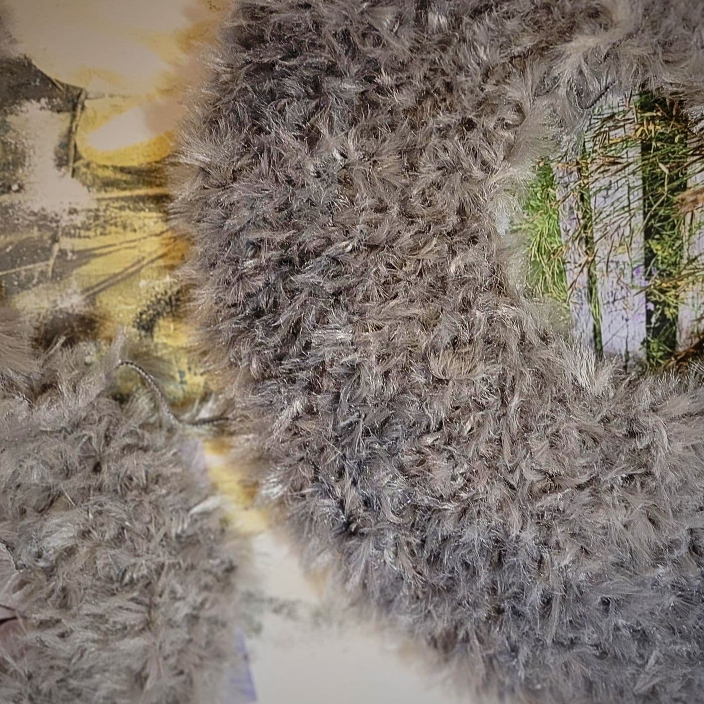 Landscape textured artwork made with various materials through photography, crochet ad monoprint.