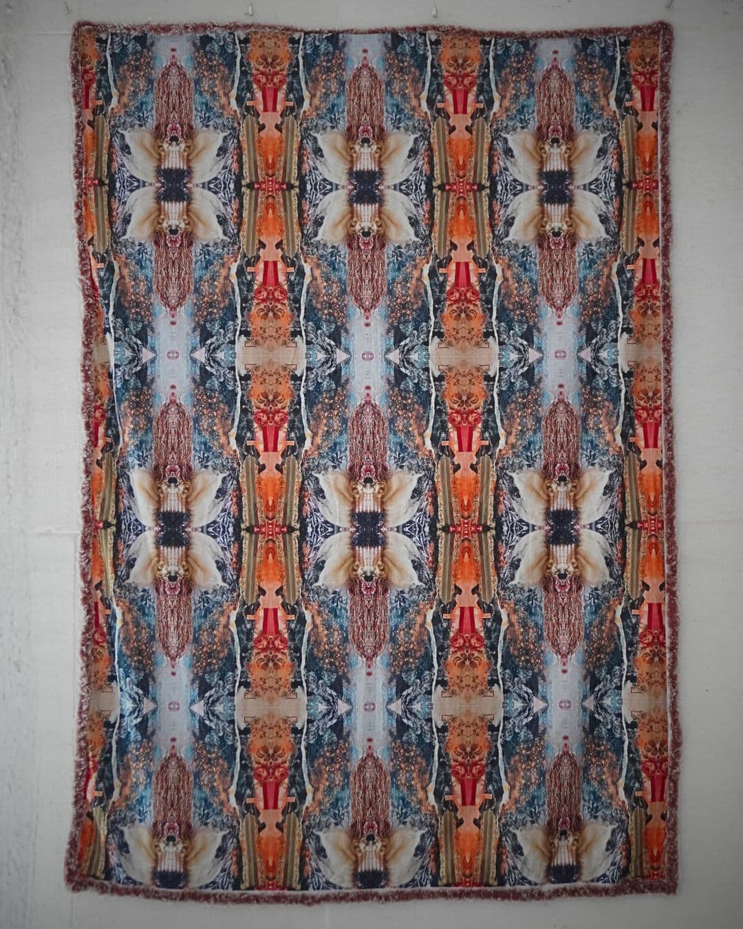 Vibrant patterned textile made with various materials.