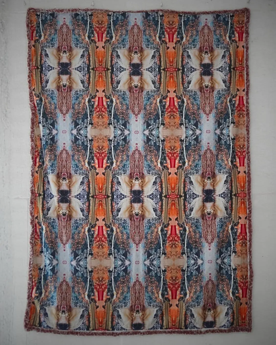 Vibrant patterned textile made with various materials.