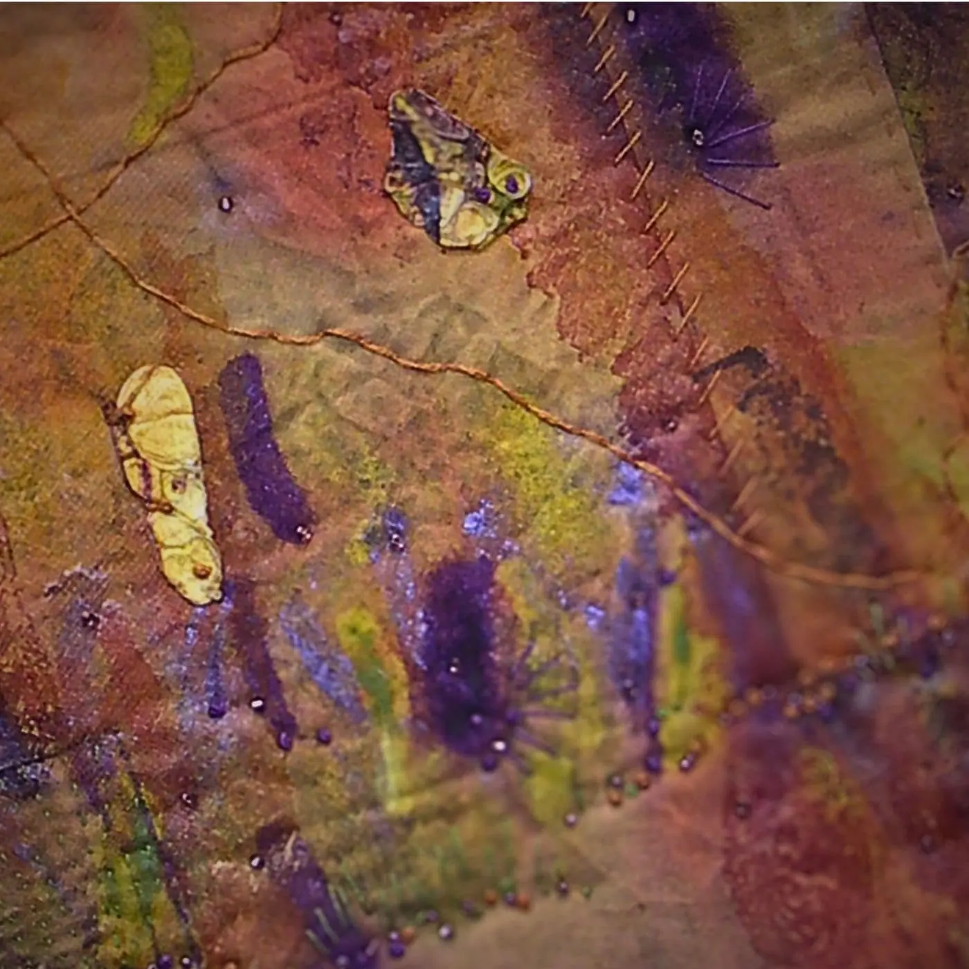 A combination of direct painting, collage, hand stitch.