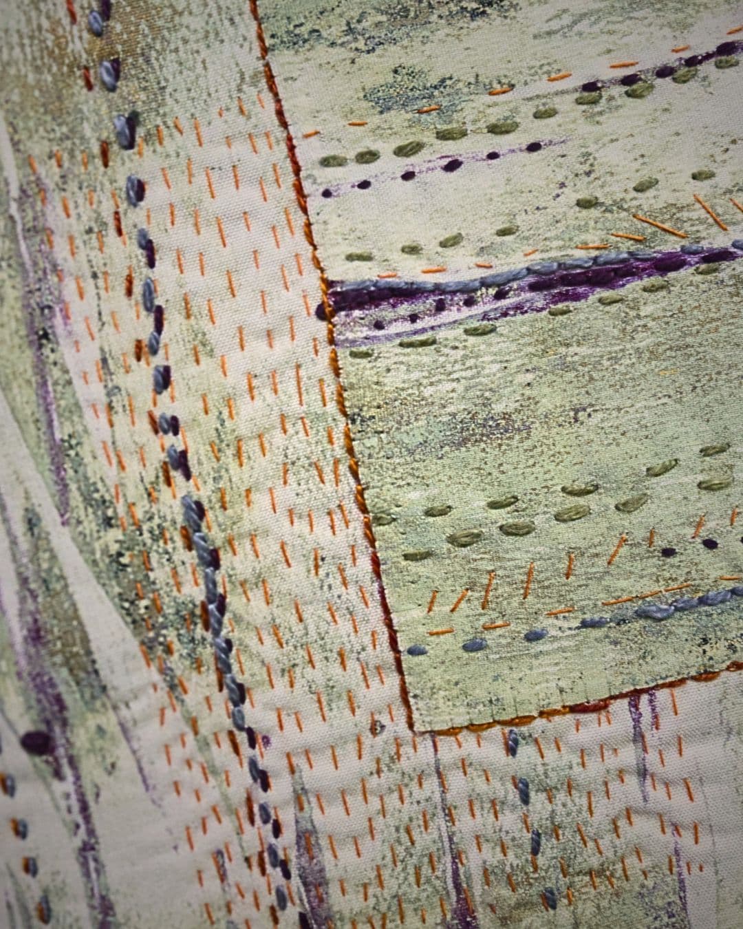 Artwork made with a combination of Monoprinting, direct painting, collage & hand stitch.