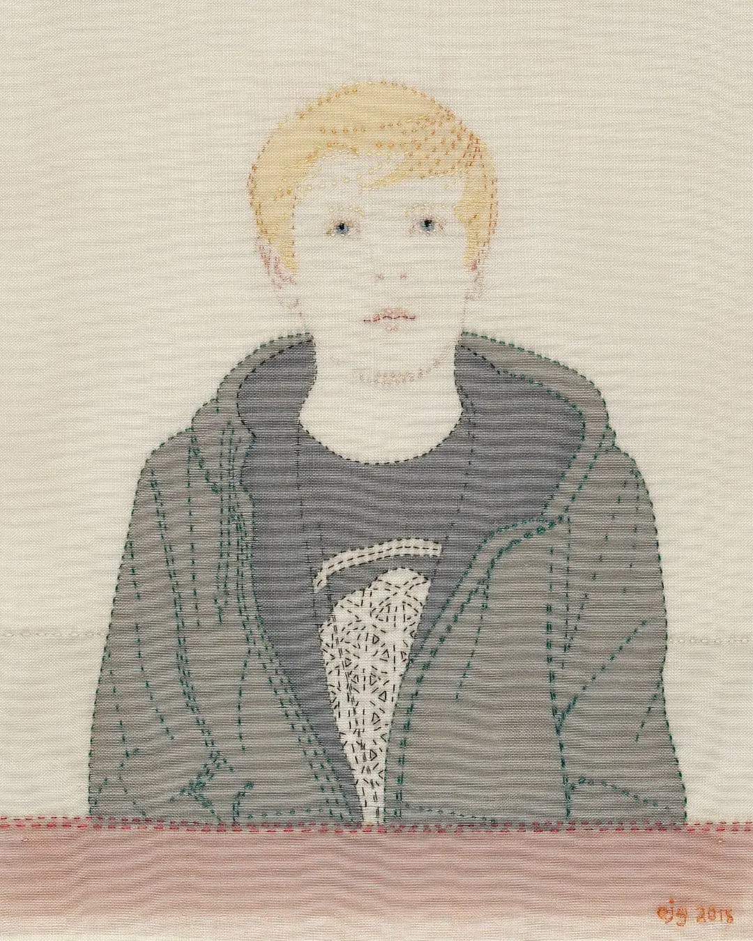 Stitched artwork of a boy.