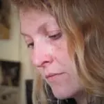 A close up image of textile artist Emily Tull working in her studio.