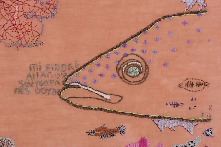 Fisk, detail with Welsh text (about the addressee being out of office)