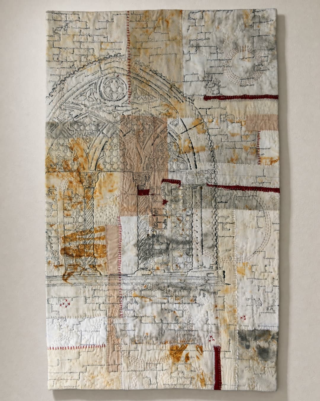 Textile art depicting architectural ruins.