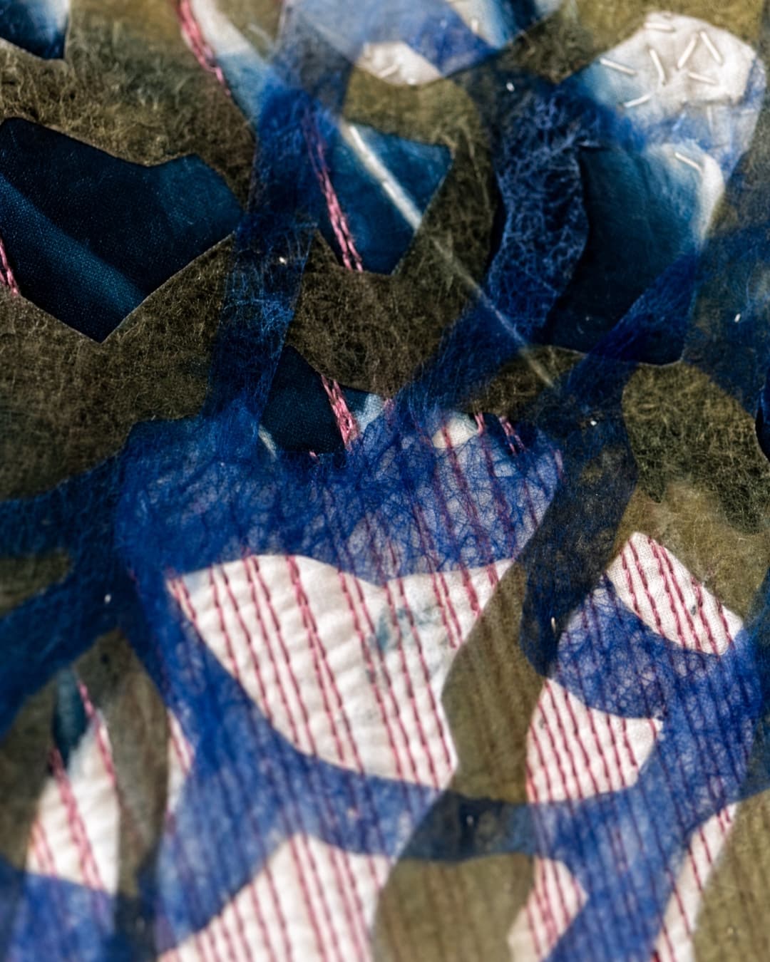 Layered textures in blue and white.