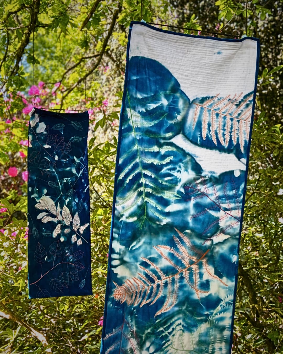 Two textile pieces with botanical patterns.