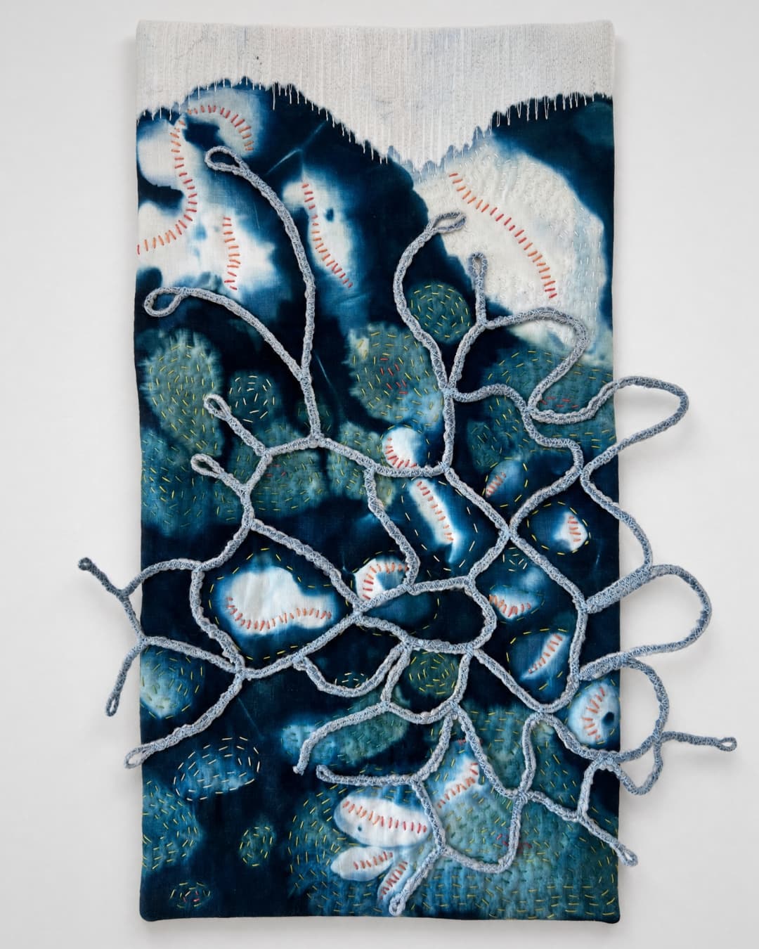 Abstract textile art with intricate patterns
