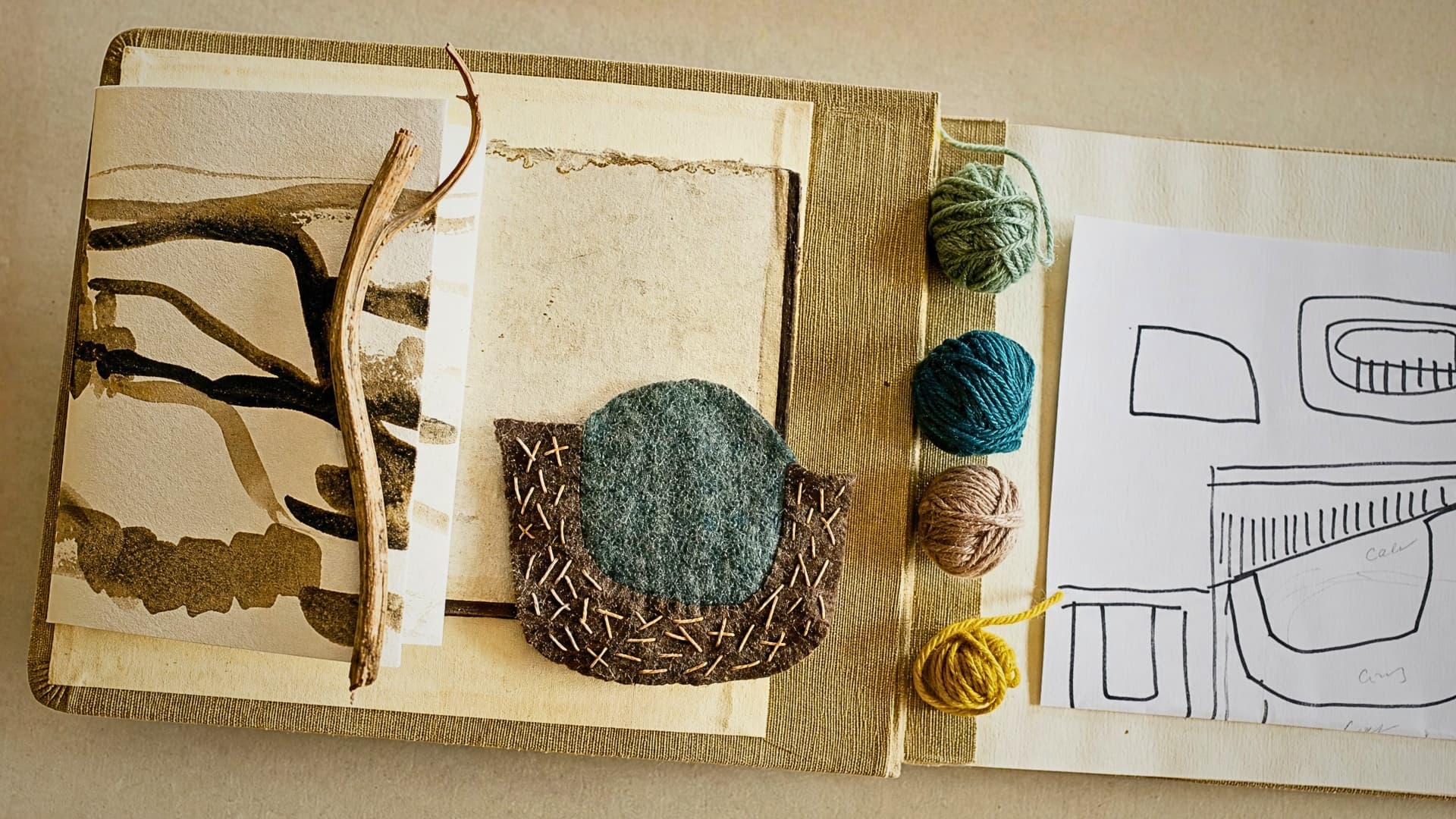 Art materials and nature-inspired sketches.