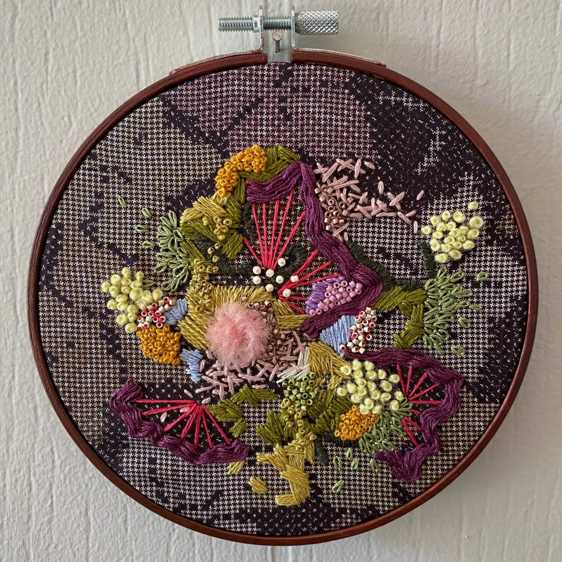 Colourful floral embroidery in hoop