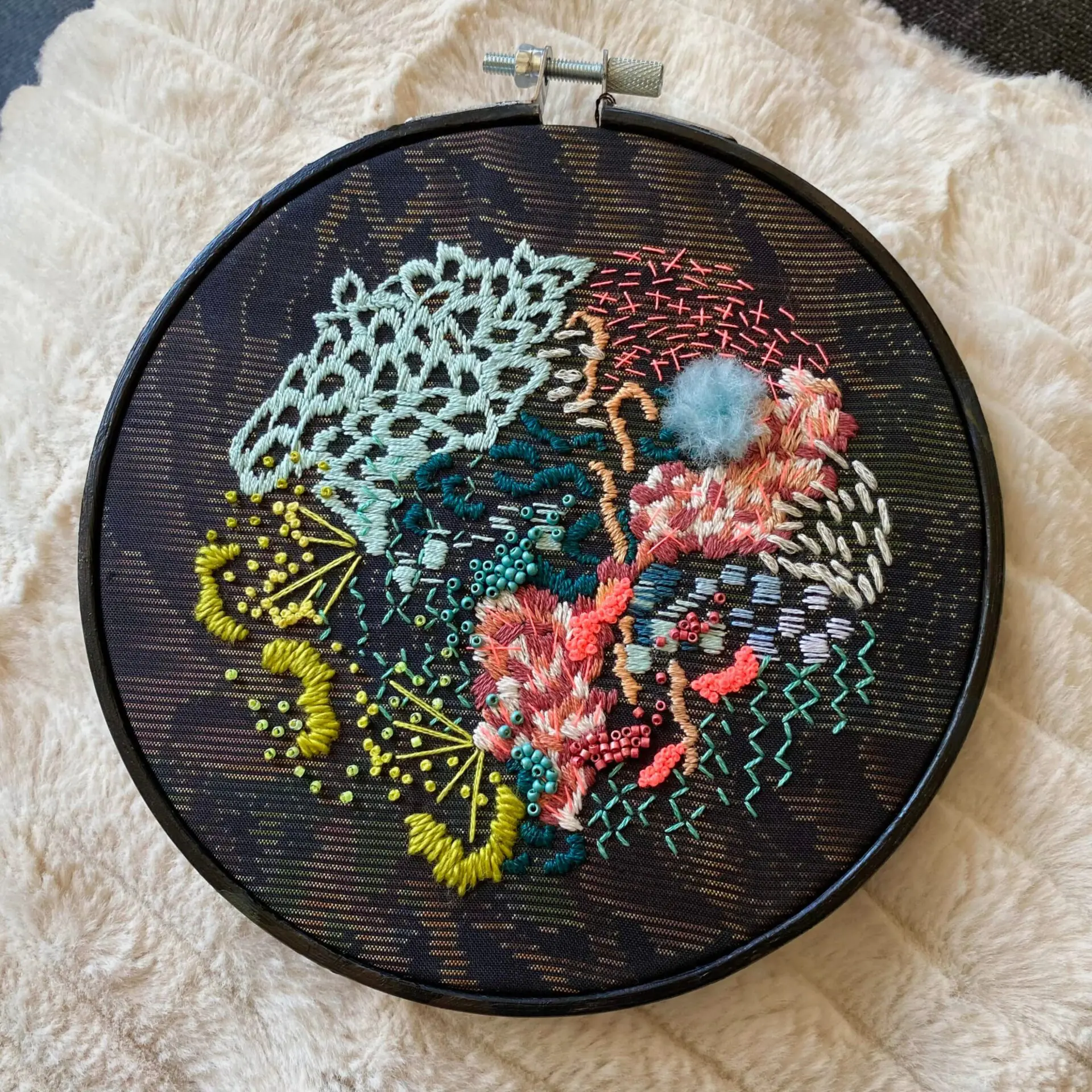 Colourful abstract embroidery in hoop