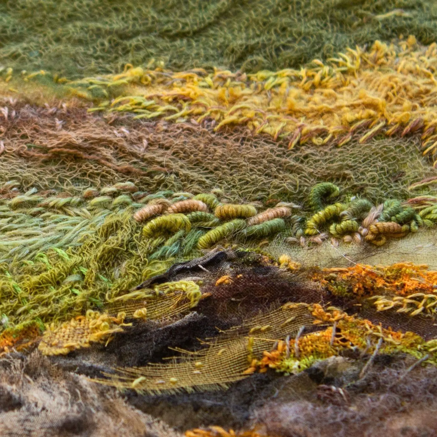 A close up of a stitched artwork of Killin Loch.