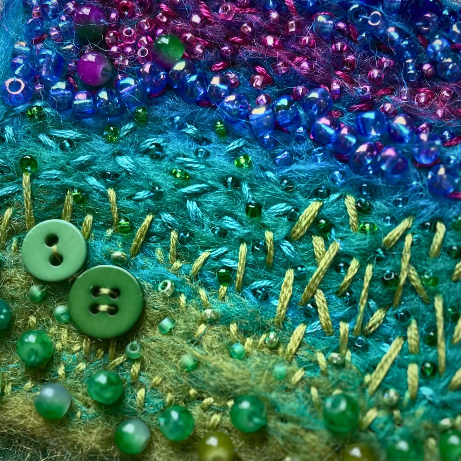 Colourful beads and textured embroidery