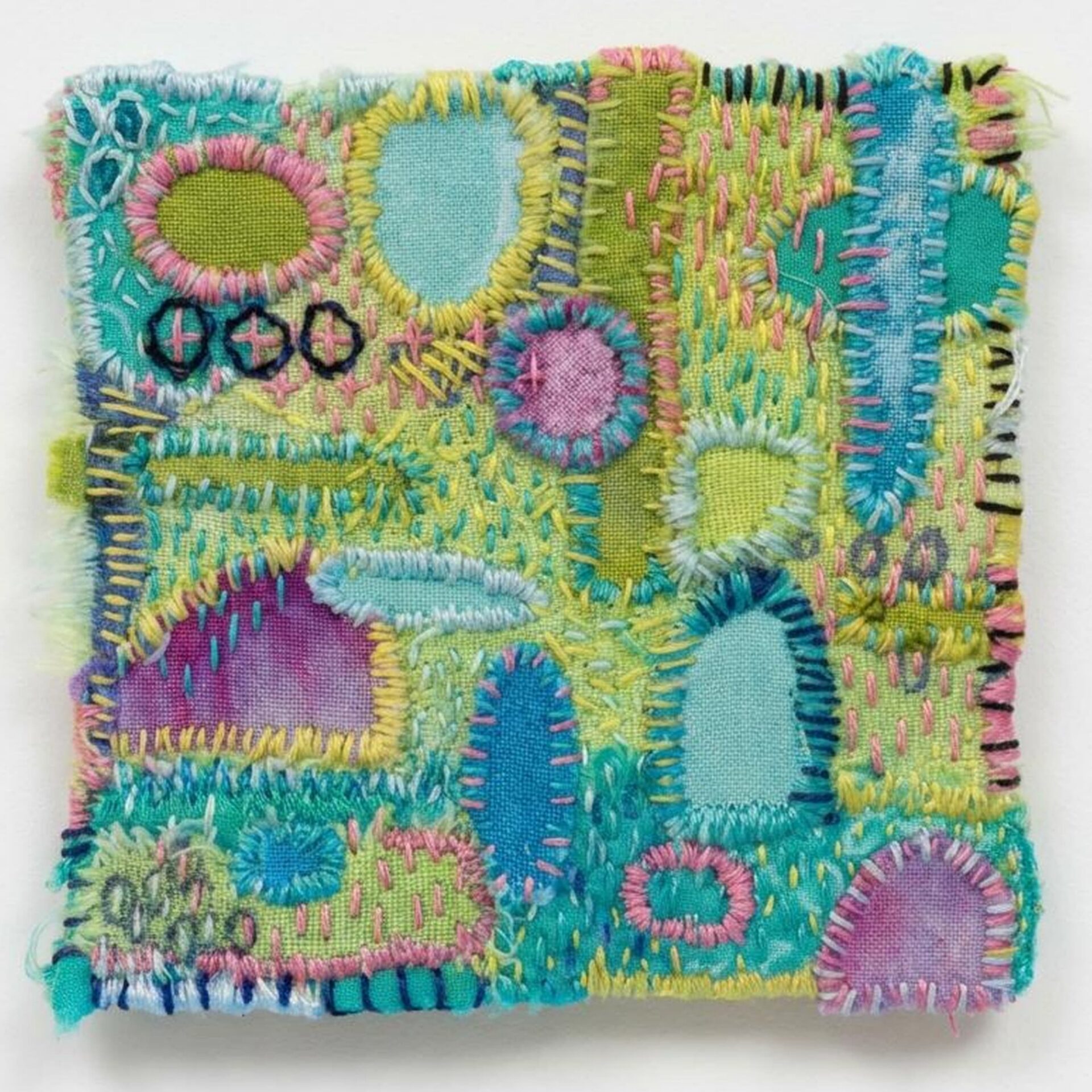 Colourful abstract textile art piece