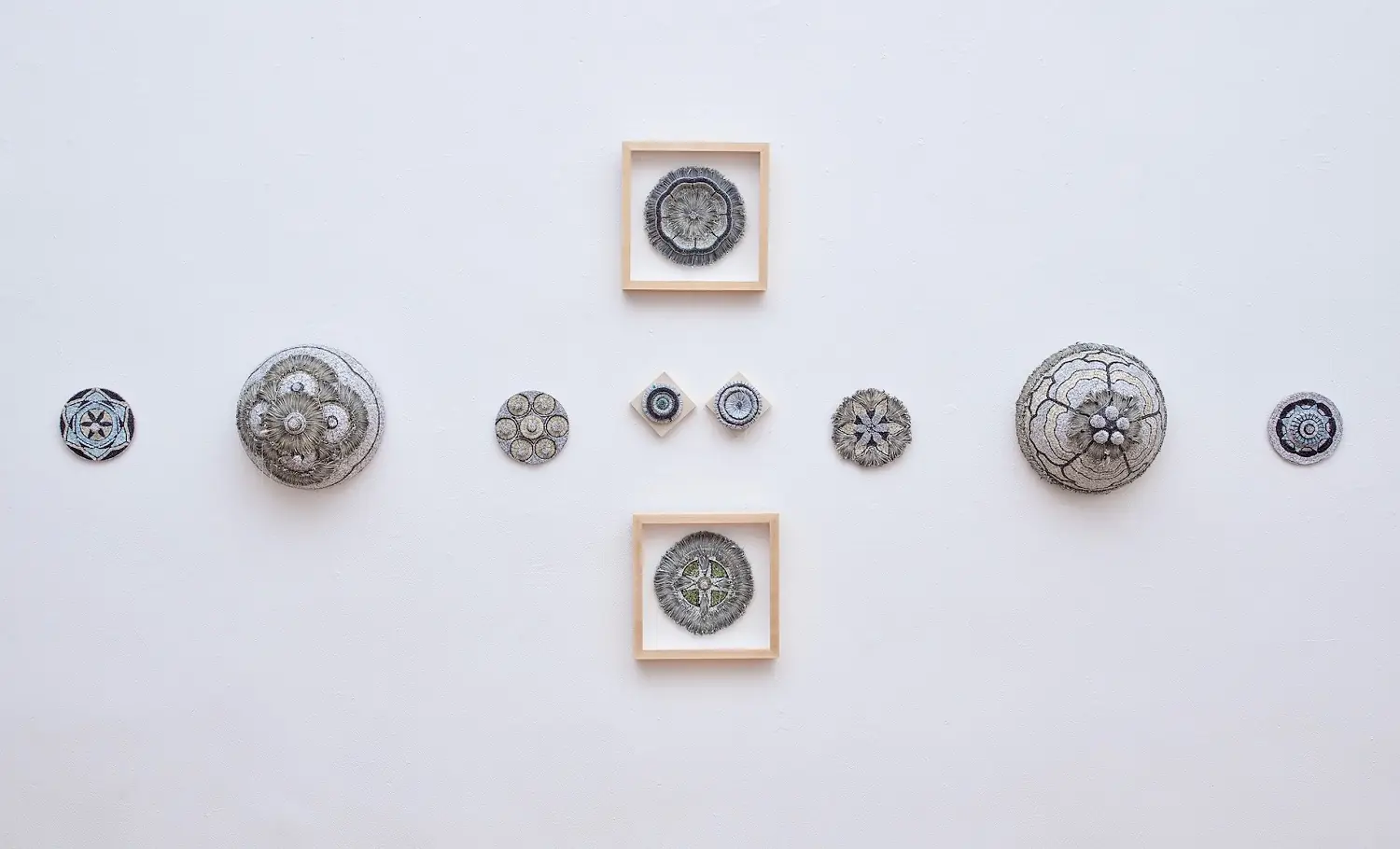Jaynie Crimmins: A Field Guide to Getting Lost, installed at the Clemente Soto Cultural Center, NYC, 2018, Shredded promotional mailings over armatures mounted on wood and framed