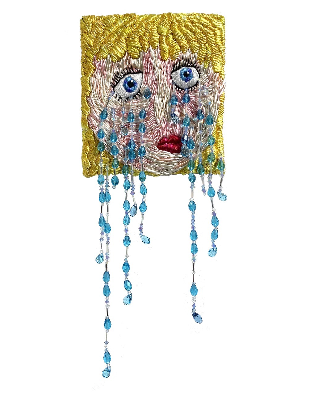 Beaded portrait of a woman with beaded tears