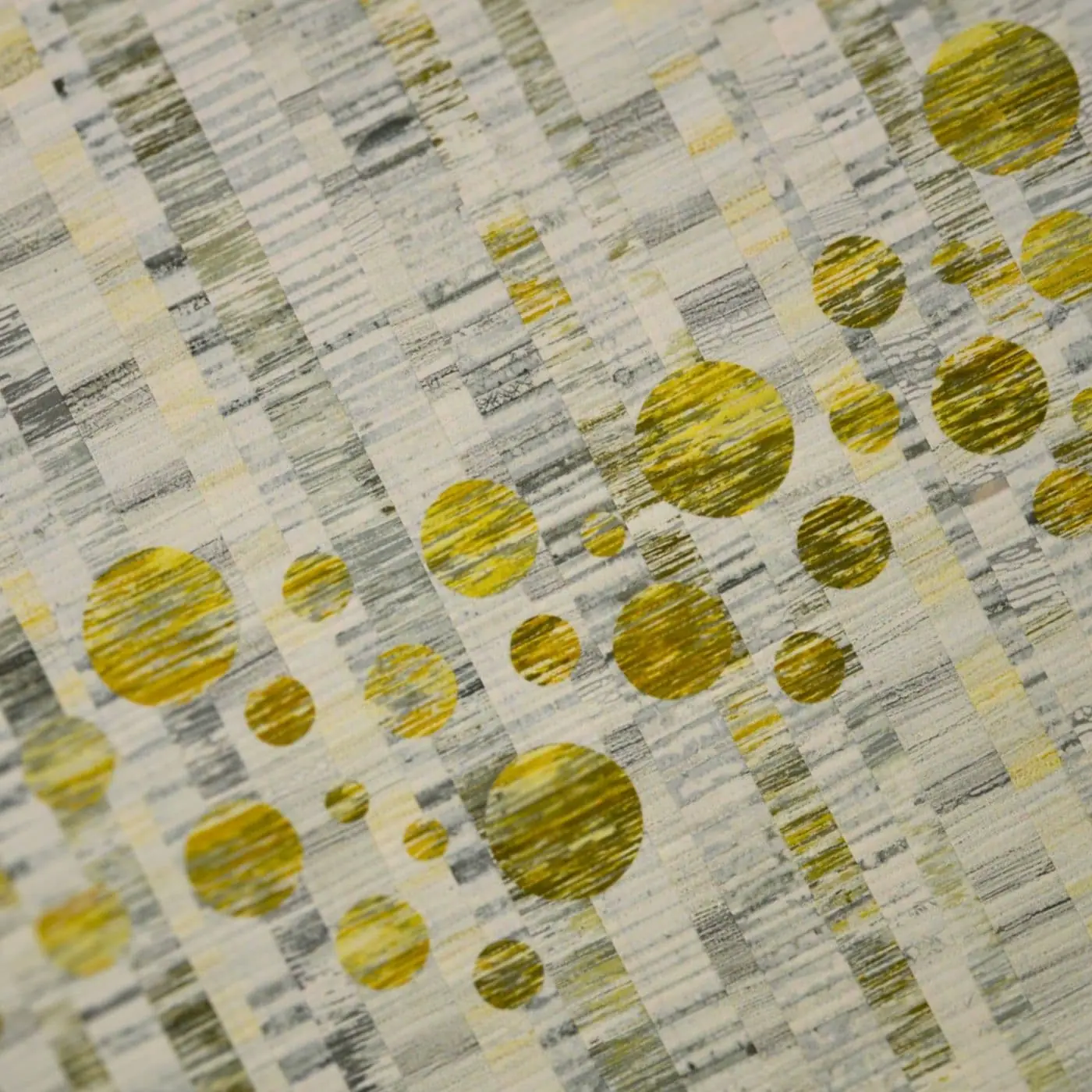 close up of fabric with green detailing using various printing techniques
