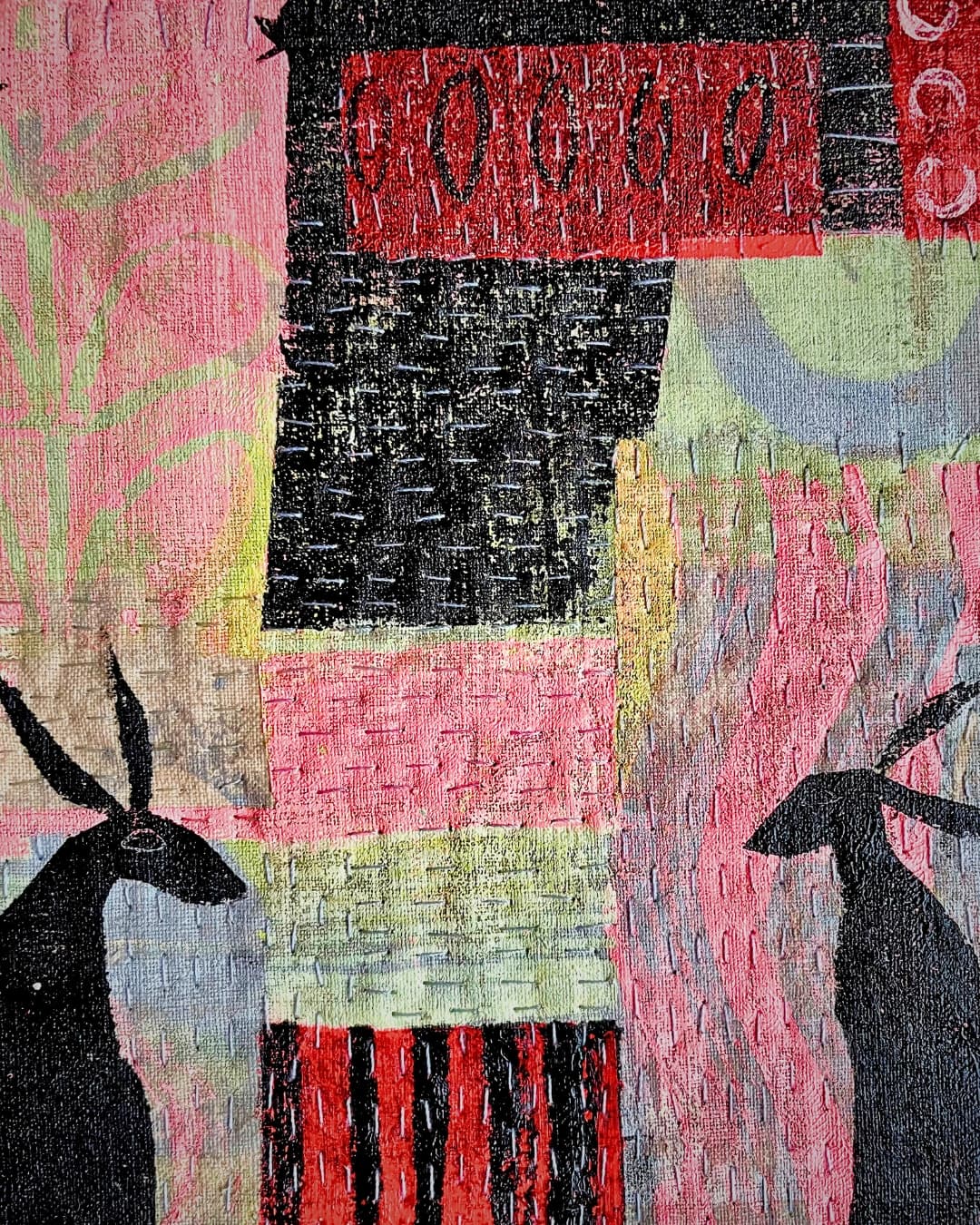 Abstract fabric design, embroidered background with hares.