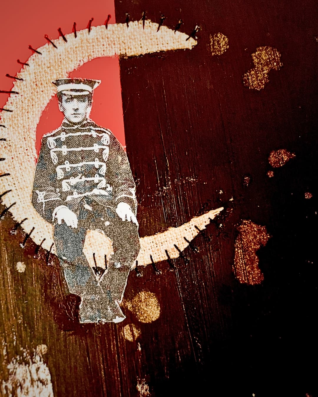 Artistic collage of military figure with added stitch.