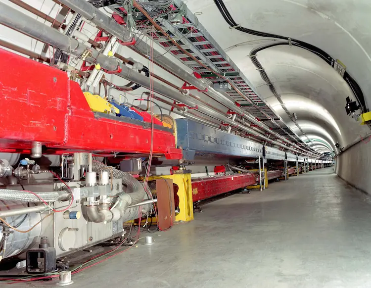 Magnets in Fermilab’s underground tunnel by Reidar Hahn