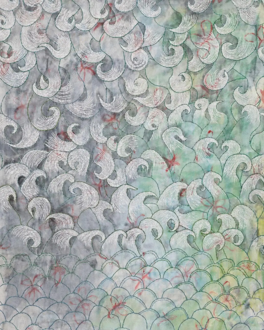 Abstract textile swirling patterns in soft colours.
