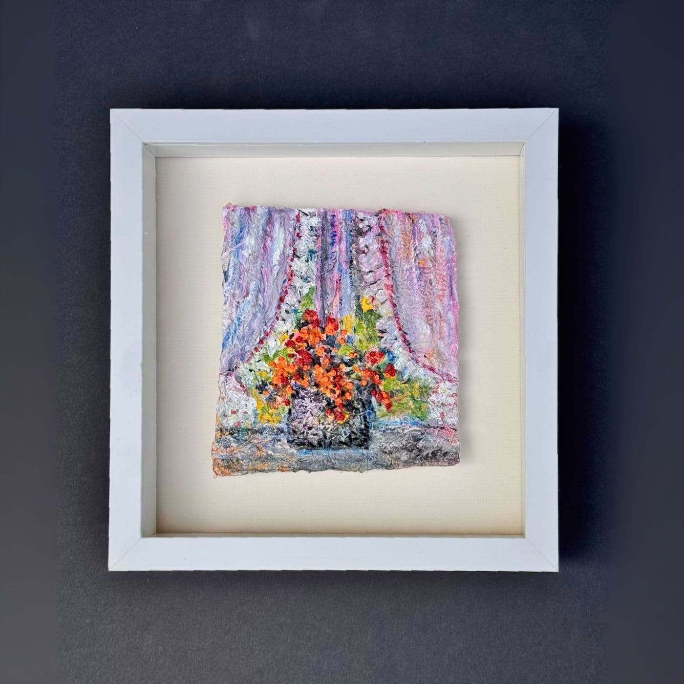 Hand embroidery painting of a window scene