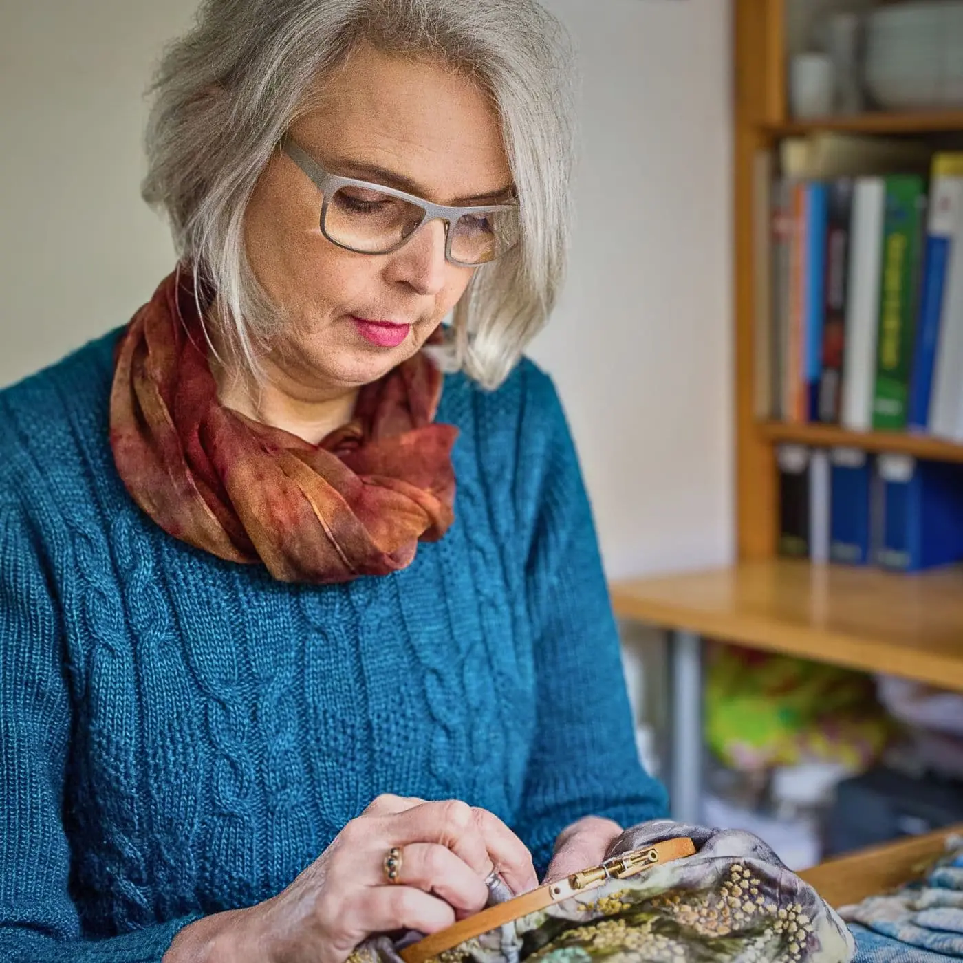 Textile artist Mirjam Gielen stitching in her studio