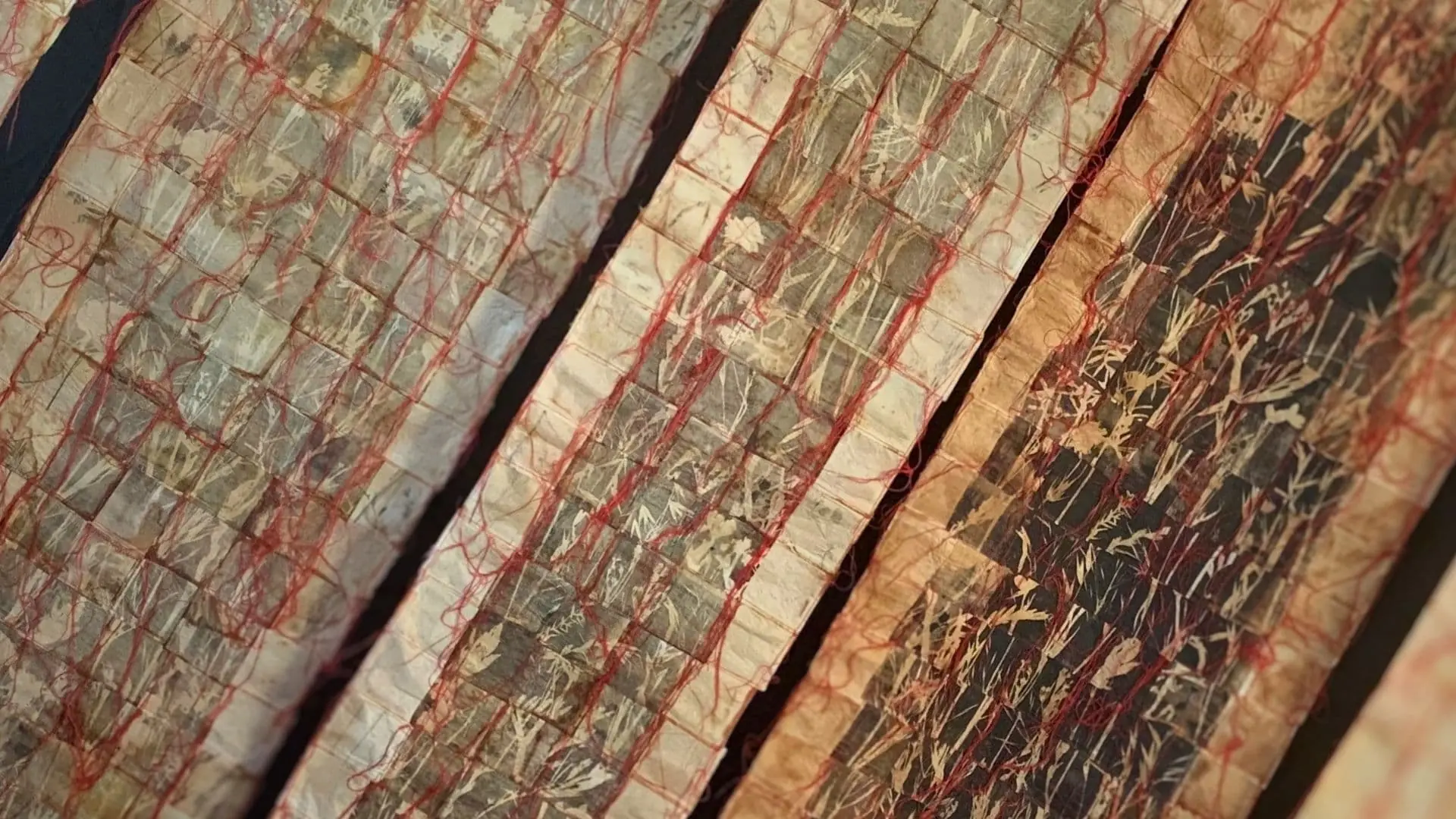 A close up of a textile art piece