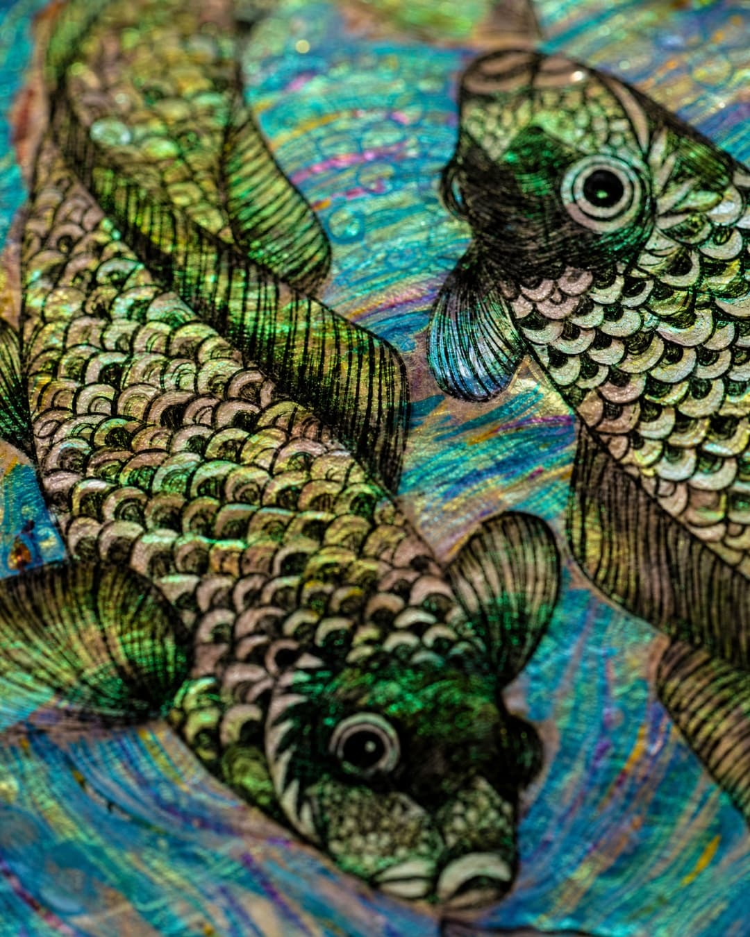 Colourful fish swimming in vibrant water.